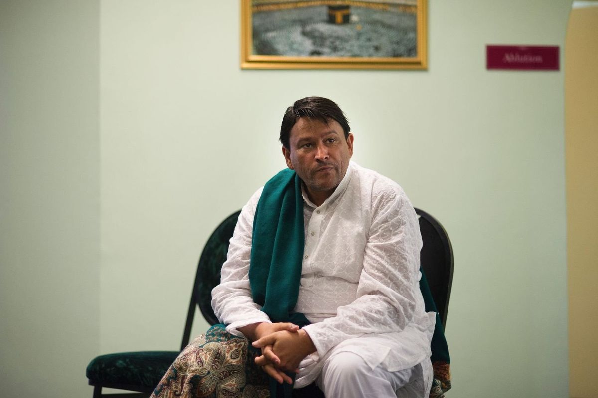 Imam Muhsin Hendricks gets ready for the start of the Jumu'ah prayer at the Inner Circle Mosque, in Wynberg, on Sept. 2, 2016, in Cape Town.